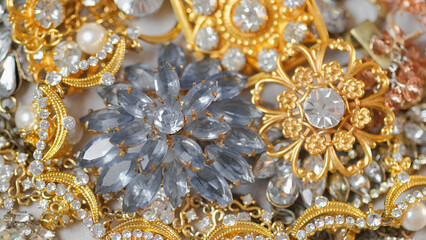 Jewelry. Background from many beautiful female fashion jewel with precious shiny stones, pearls and diamonds for women. Wealth and luxury concept, closeup, macro
