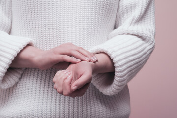 Female hands taking pulse. Hand signs communication concept