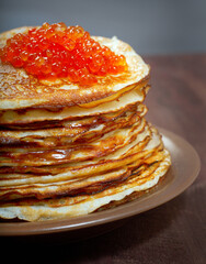 Russian pancakes  with red caviar