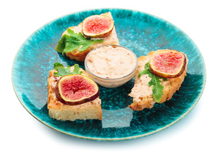 Tasty sandwiches with fig on white background