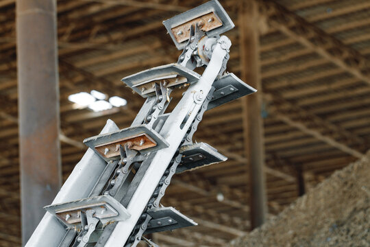 Empty industrial conveyor belt in a workshop