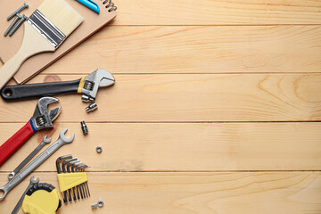 Set of tools on wooden background