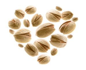Salted pistachios in the shape of a heart on a white background