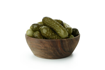 Wooden bowl with pickled cucumbers isolated on white background