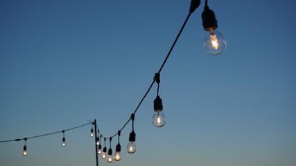Vintage lamps against sky