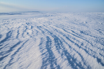 Natural abstract background. Snow surface.