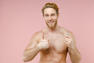 Smiling bearded naked young man 20s years old perfect skin hold tweezers showing thumb up isolated...