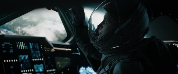 Portrait of Caucasian male astronaut inside spaceship cockpit. Sci-fi space exploration concept. Shot with 2x Anamorphic lens