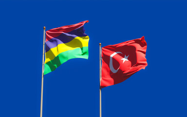 Flags of Mauritius and Turkey.