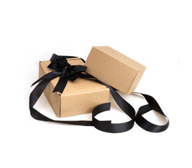 Two craft boxes with black bow and ribbon isolated on white background