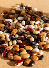 many dried multi-colored beans closeup, an assortment of various kidney beans