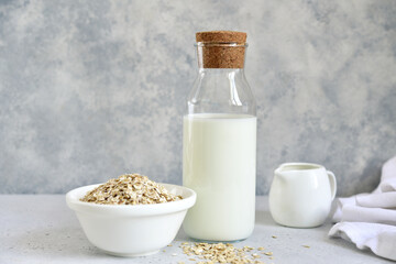 Obraz na płótnie Canvas Organic non dairy oat milk in a bottle