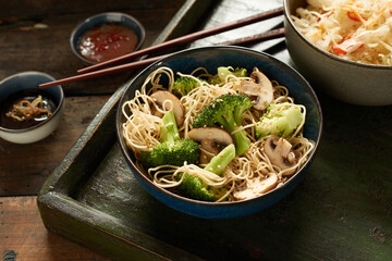 Yummy noodles and sauerkraut served on tray