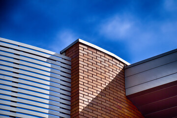 Fototapeta na wymiar elegant building on a blue sky background modern architecture