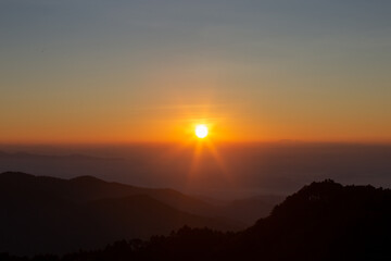 On the top of the mountain, in the morning the sun shone beautifully