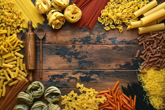 Assortment of natural organic pasta. Top view with copy space.