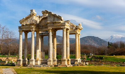 Fototapeta premium Ruins of tetrapylon of monumental gateway at Aphrodisias, ancient Hellenistic city in Anatolia, Turkey
