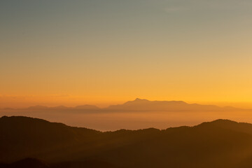 On the top of the mountain, in the morning the sun shone beautifully