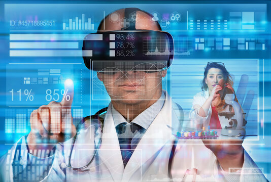 Doctor with virtual reality glasses working with a remote doctor on a virtual reality interface screen. Practitioner technician with Virtual Reality VR equipment collaborating remotely in laboratory w
