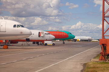 Airport with a lot of aircraft. Airplane on the platform International Airport. Runway. Planes.