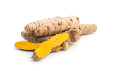 Indian turmeric root. Turmeric spice. Yellow turmeric on white background.