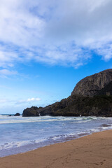 Fototapeta na wymiar beauty beach in the coast of basque countrywith small waves