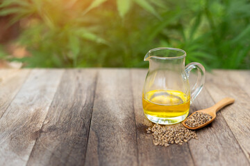 CBD hemp oil in glass jars and cannabis seeds Cannabis oil concept by researchers or medical team Use natural herbs to extract hemp oil as a medicine. Alternative medicine.
