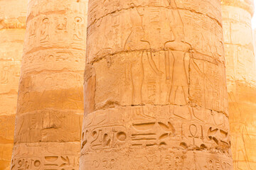 Dendera Temple complex in Egypt. Hieroglypic carvings on wall at the ancient egyptian temple.