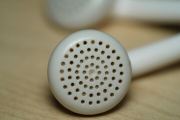 Close up shot of earphone speaker holes