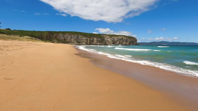 pristine Australian beach  shot in Clifton, Tasmania on a serene sunny summer day with turquoise water and golden sand