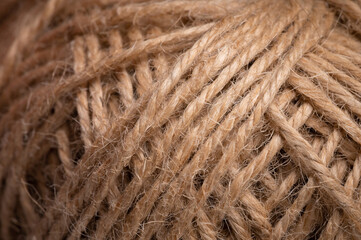Natural jute twine, macro photography. Jute thread texture. A coil of jute rope. Close-up