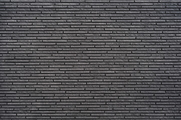 gray background from decorative facing in the form of masonry