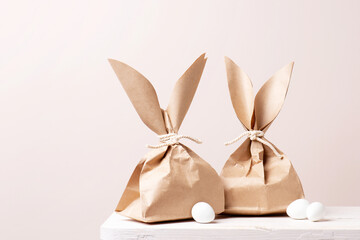 Tender festive Easter card with gifts and eggs