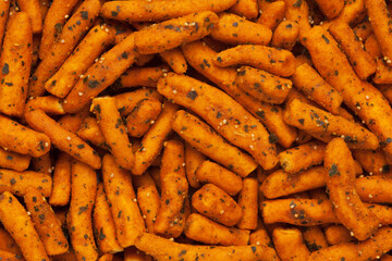 Spicy Chutney Sev in Full-Frame wallpaper, made with Chickpea flour and red chili and spices. Indian spicy snacks (Namkeen),  Top view.