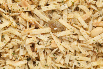 Aloo Mixture full-frame wallpaper, made with potatoes sliced, raisins, peanuts, Indian spicy snacks (Namkeen), Top view.