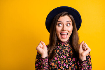 Portrait of attractive astonished person look empty space open mouth retro headwear isolated on yellow color background