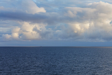Naklejka na ściany i meble Seascape with beautiful clouds. Baltic Sea