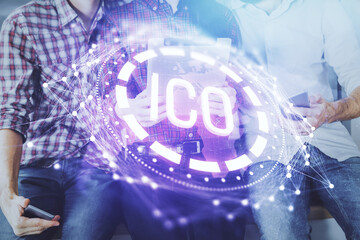 Double exposure of crypto theme drawing and man and woman working together holding and using a mobile device. Blockchain concept.