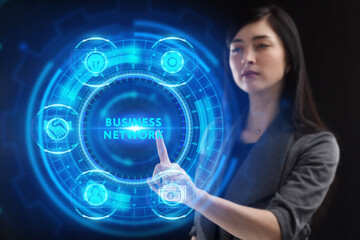 Business, Technology, Internet and network concept. Young businessman working on a virtual screen of the future and sees the inscription: Business network