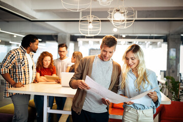 Happy creative team in office. Business, startup, design, people and teamwork concept