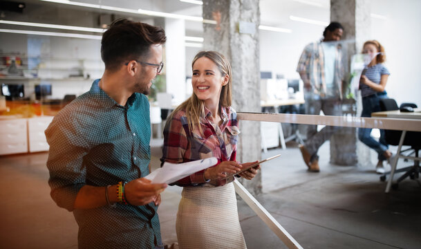 Business people brainstorming and chatting at workplace office