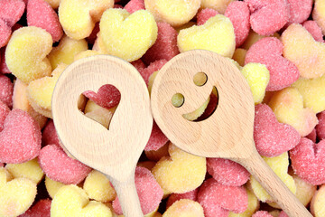 Smile wooden spoons on the many gnocchi hearts shape