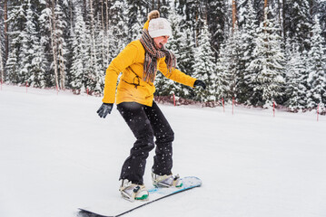 Fototapeta na wymiar Winter entertainment. snowboard