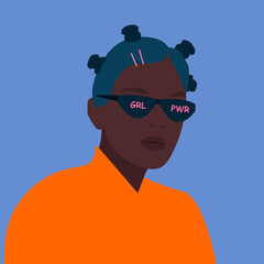 Portrait of beautiful black teenage girl in sunglasses with the inscription girl power. International women’s day. 8th march. Women empowerment movement