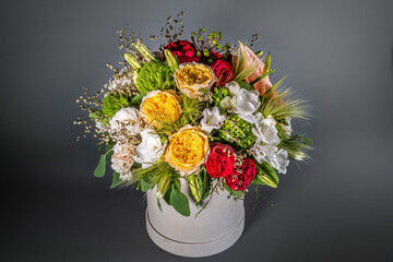 Close up wedding bouquet of flowers Isolated on a gray background. Delicate bouquet in pastel colors. Summer flowers