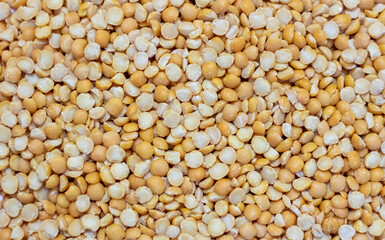 Background of dried peas close-up. The texture of the dried peas
