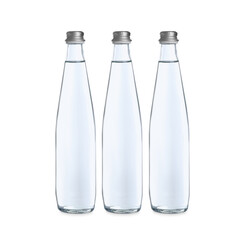 Glass bottles with soda water on white background