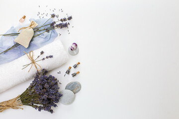 Obraz na płótnie Canvas Spa concept, towel, dry lavender, on a white background with a copy of the space