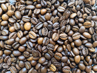 Coffee bean background close-up. Texture of coffee beans