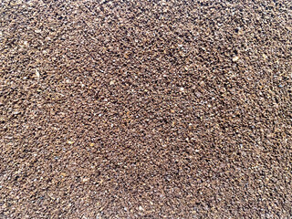 Background of ground insoluble coffee close-up. Texture of ground coffee